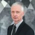 u8283199872_A_realistic_professional_portrait_of_an_older_man_5d219b9b-88a2-4509-bfde-2f7486707b6e_3